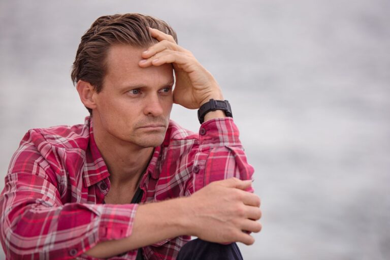 photo-of-man-wearing-pink-sport-shirt